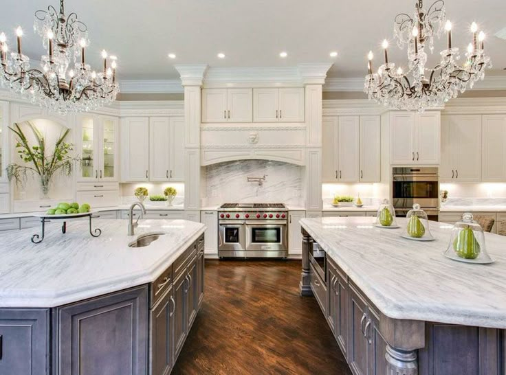 Beautiful Kitchen With White Cabinets And Carrara Marble Countertops intended for