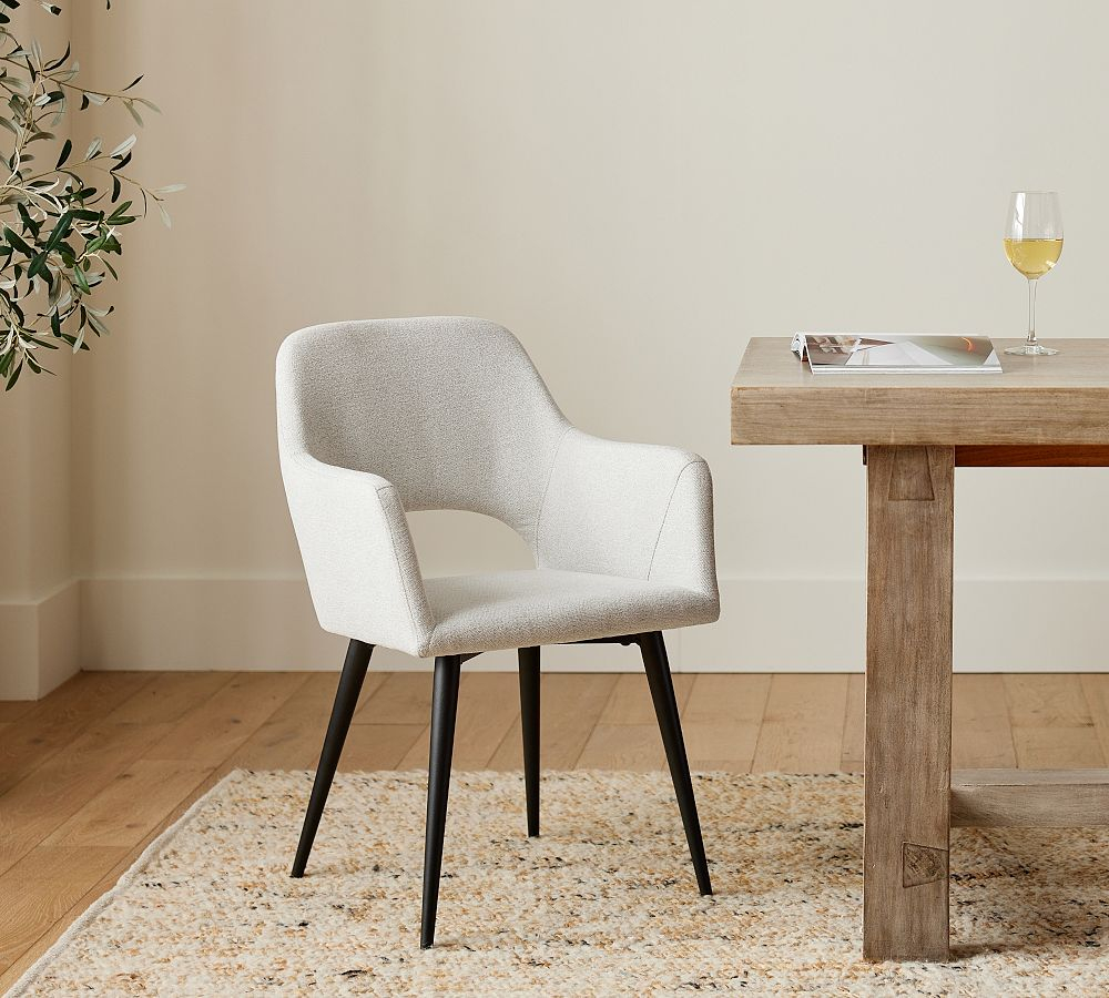 Ivy Upholstered Dining Armchair | Pottery Barn in Exploring the Design Philosophy Behind The Iven Dining Armchair